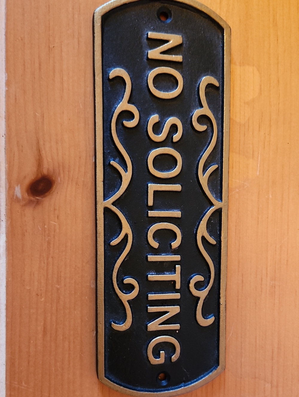 No Soliciting Cast Metal Door Sign in Black and Gold 9x3